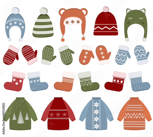 Winter clothing set with hats, sweater, socks, mittens. Clothes with different textures isolated on white background. Items for cold season. Collection of warm clothes for Christmas.