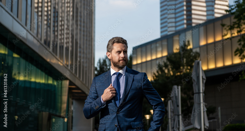 business success. successful man in businesslike suit. manager executive outside the office business success. successful man in businesslike suit. manager executive outside the office