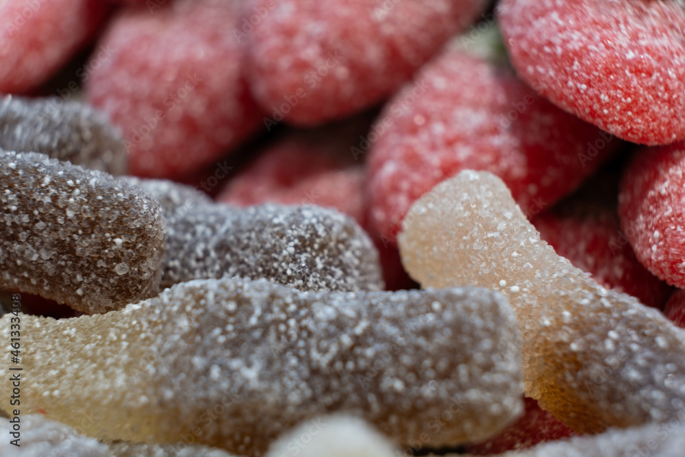 Colorful sweet jelly and candies with sugar. Macro. Colorful sweet jelly and candies with sugar. Macro.