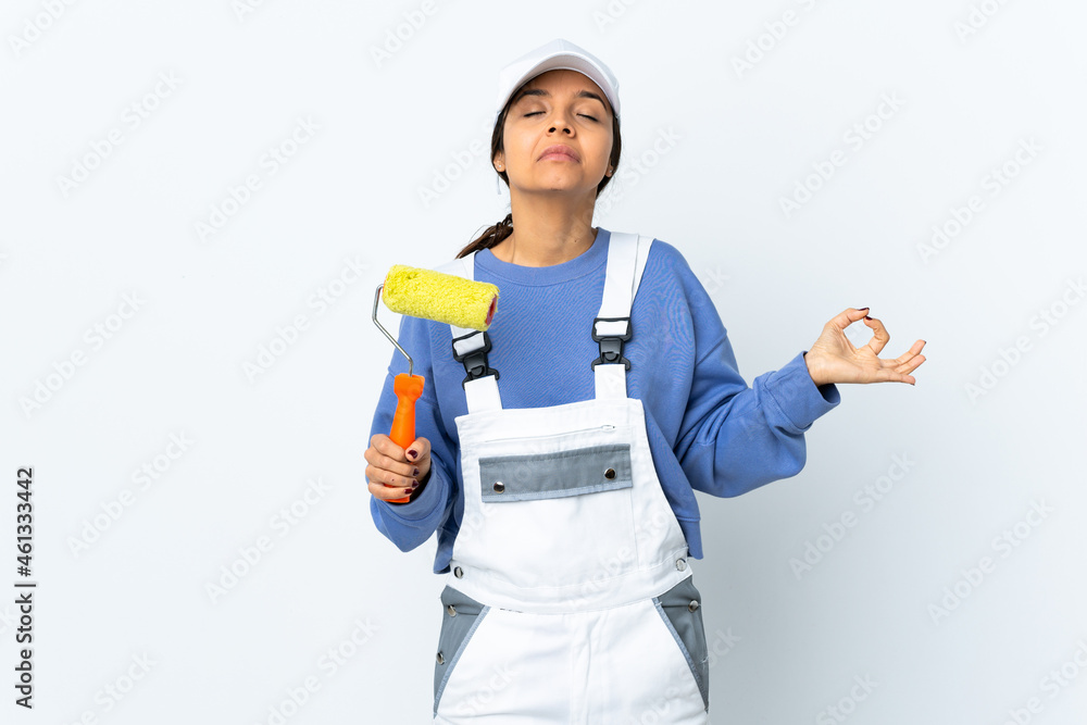 Painter woman over isolated white background in zen pose Painter woman over isolated white background in zen pose