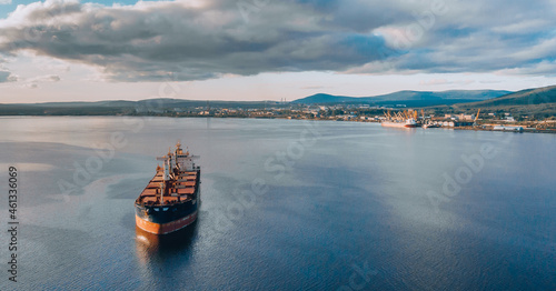 Large cargo ship in the White sea aerial view.
