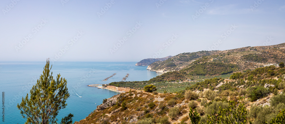 Promontory of the Gargano between Vieste and Mattinata in summer. Panoramic view.. Sea and hills seen from above, Puglia, Italy.