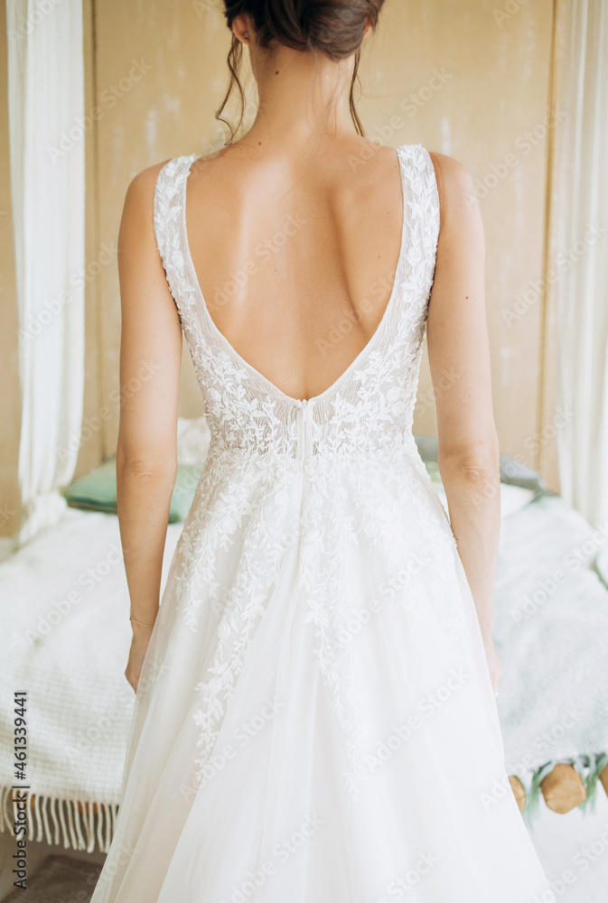 Details of style and tailoring of a dress. Details of style and tailoring of a dress.