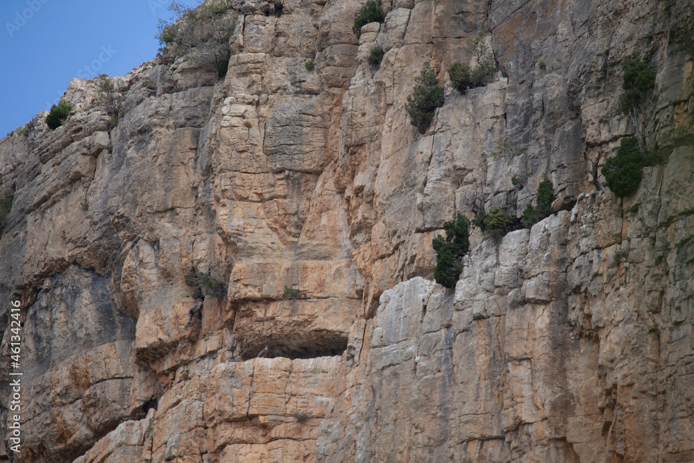 Rocky mountains with vultures  Las Balagueras reservoir in Rubielos de Mora Teruel Aragon Spain