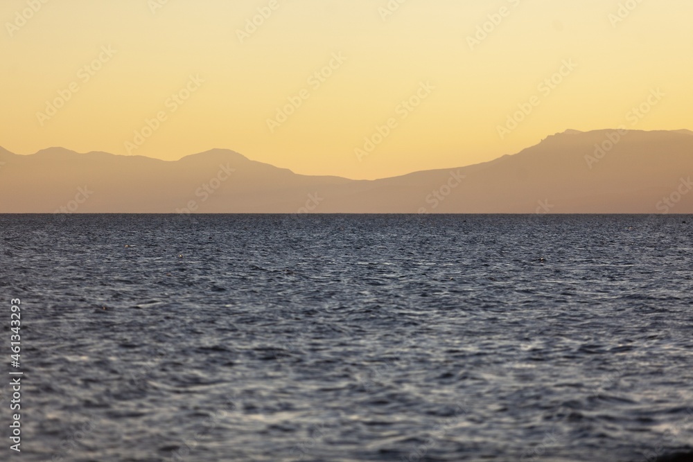 Amazing beach sunset with endless horizon Amazing beach sunset with endless horizon