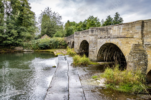 Arched bridge over the river in Leintwardine, Herefordshire, England