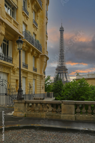 Fototapeta Naklejka Na Ścianę i Meble -  View of Eiffel Tower on street in Paris. Eiffel Tower is an architecture and landmark of Paris.