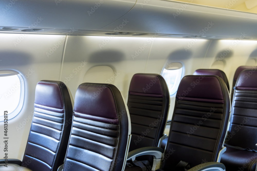 Fototapeta premium Left armchairs in a built-in chairs Aircraft Cabin Economy class