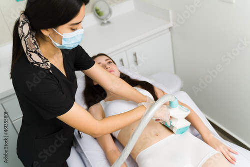Slim woman doing a rejuvenating treatment