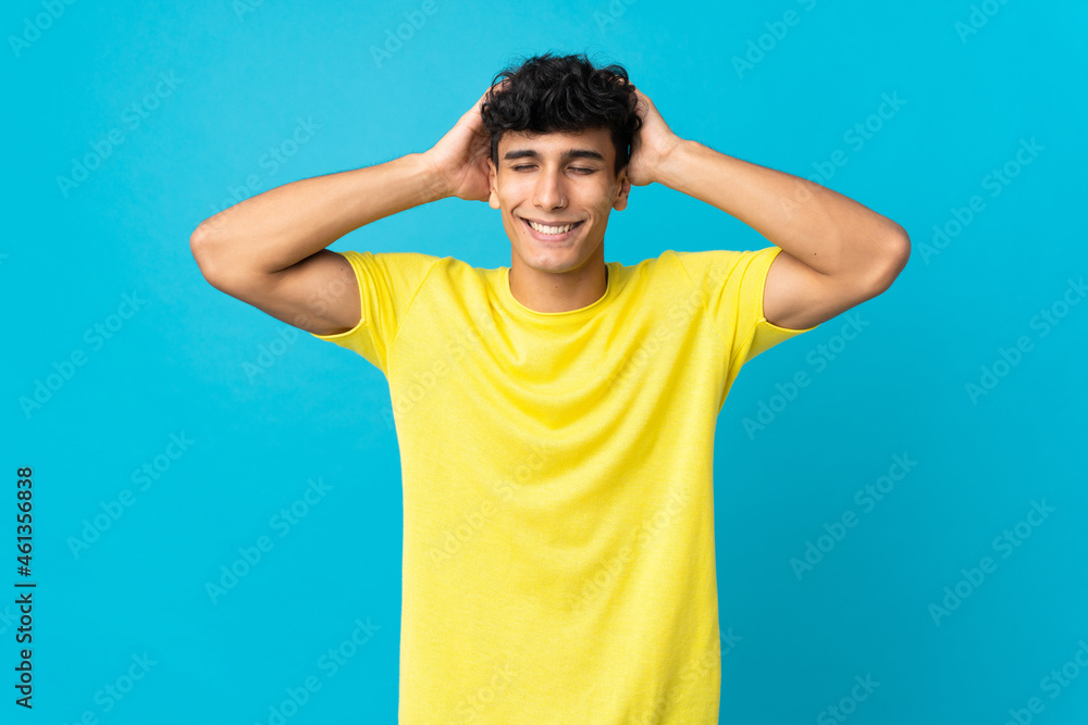 Young Argentinian man isolated on background laughing Young Argentinian man isolated on background laughing