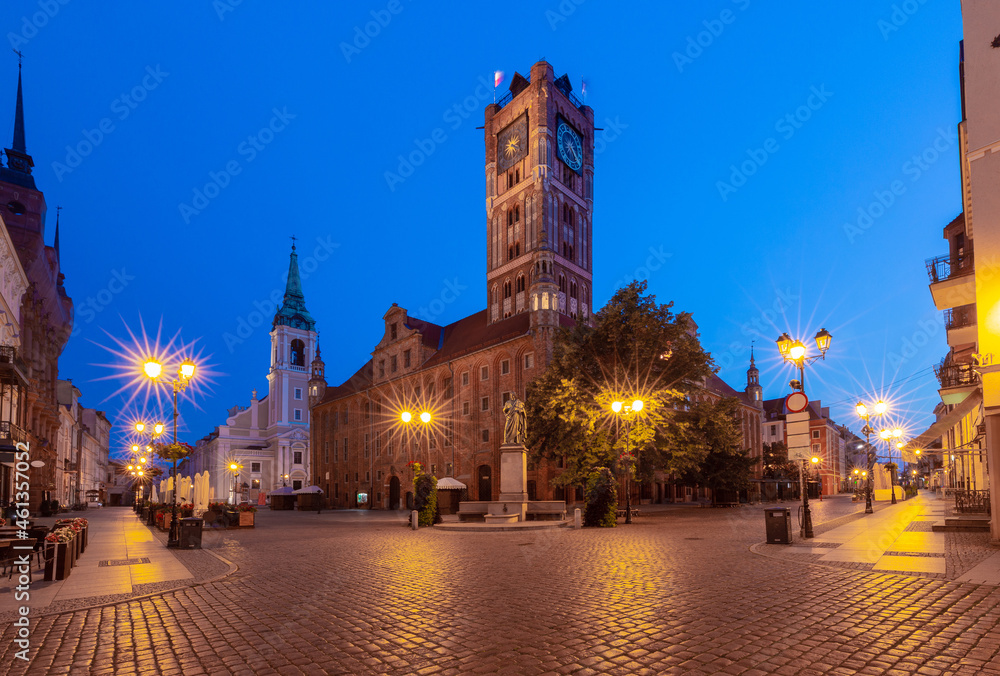 Torun. Old market square and town hall at sunrise.