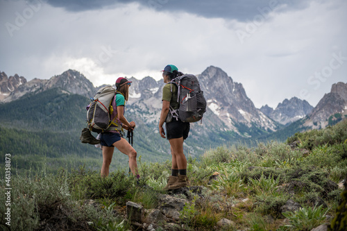 Two women backpacking at Sawtooths Stanley Idaho. photo