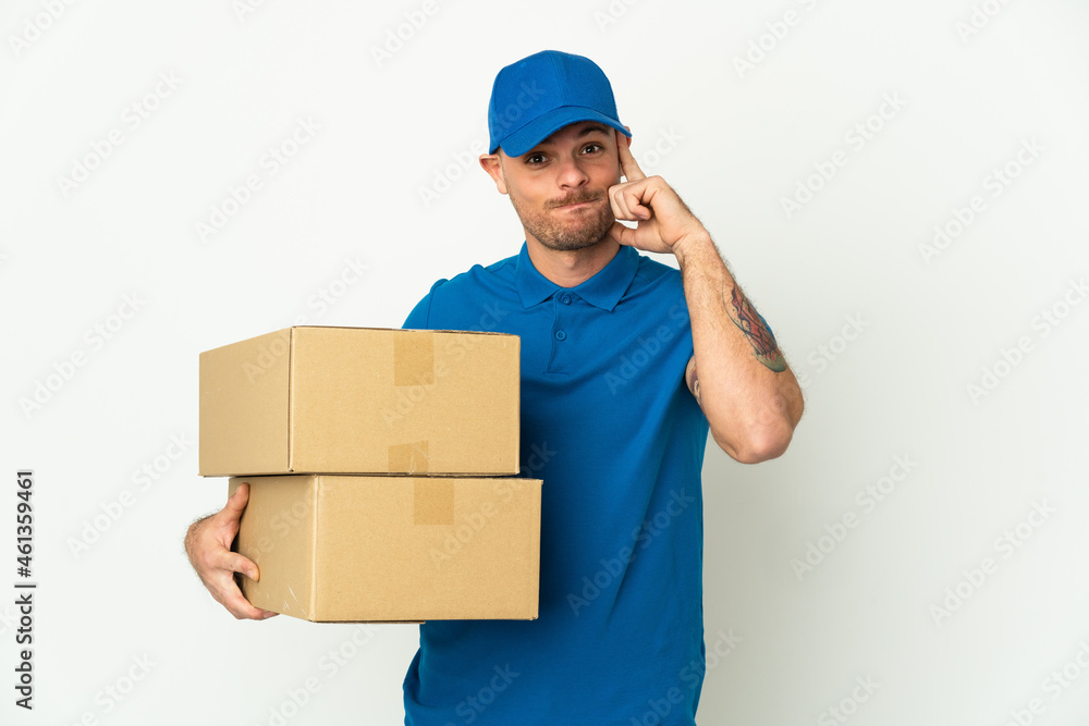 Delivery caucasian man isolated on white background thinking an idea Delivery caucasian man isolated on white background thinking an idea