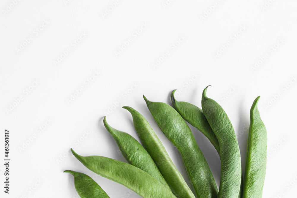 Green bean pods, spread out with fans. Space for text. Green bean pods, spread out with fans. Space for text.