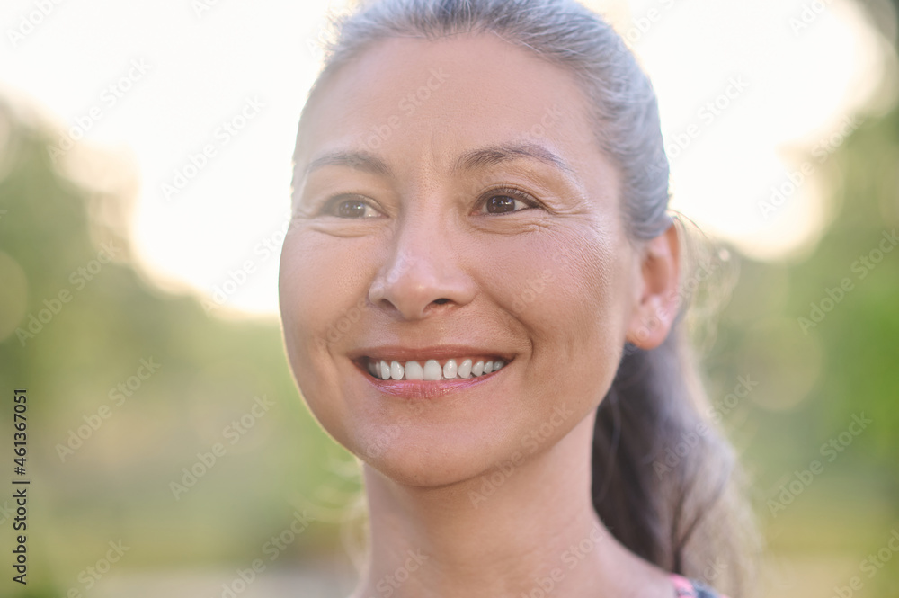 A picture of a pretty mature smiling woman A picture of a pretty mature smiling woman
