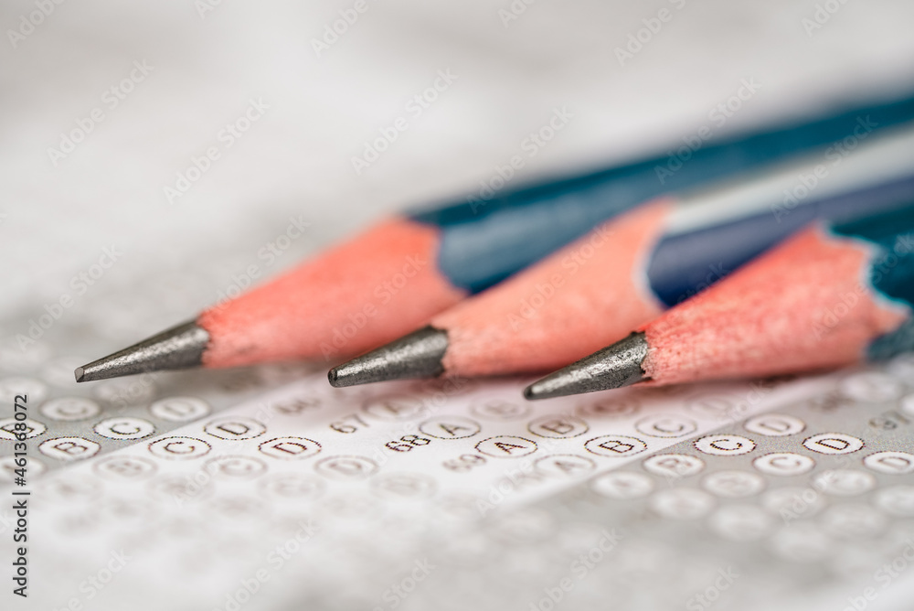 Close Up Pencil On The Answer Sheet For Test Score Sheet With Answers close-up-pencil-on-the-answer-sheet-for-test-score-sheet-with-answers