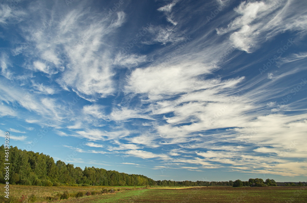 Dramatic white clouds and blue sky in Skrunda, Latvia. Dramatic white clouds and blue sky in Skrunda, Latvia.