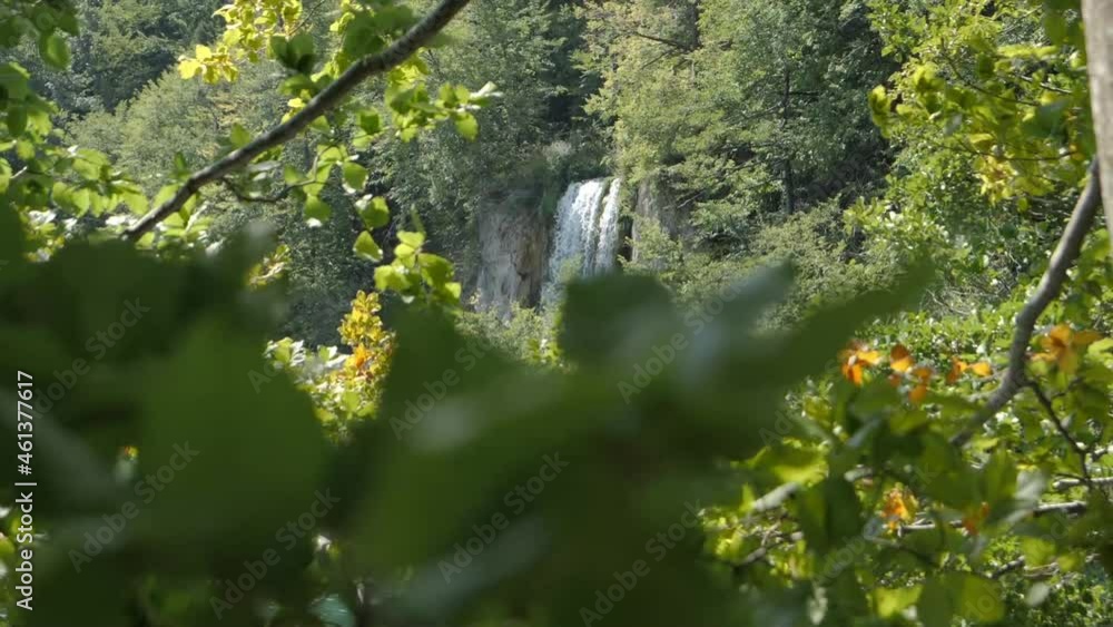 Majestic waterfall in Plitvice National Park, distance reveal shot Majestic waterfall in Plitvice National Park, distance reveal shot