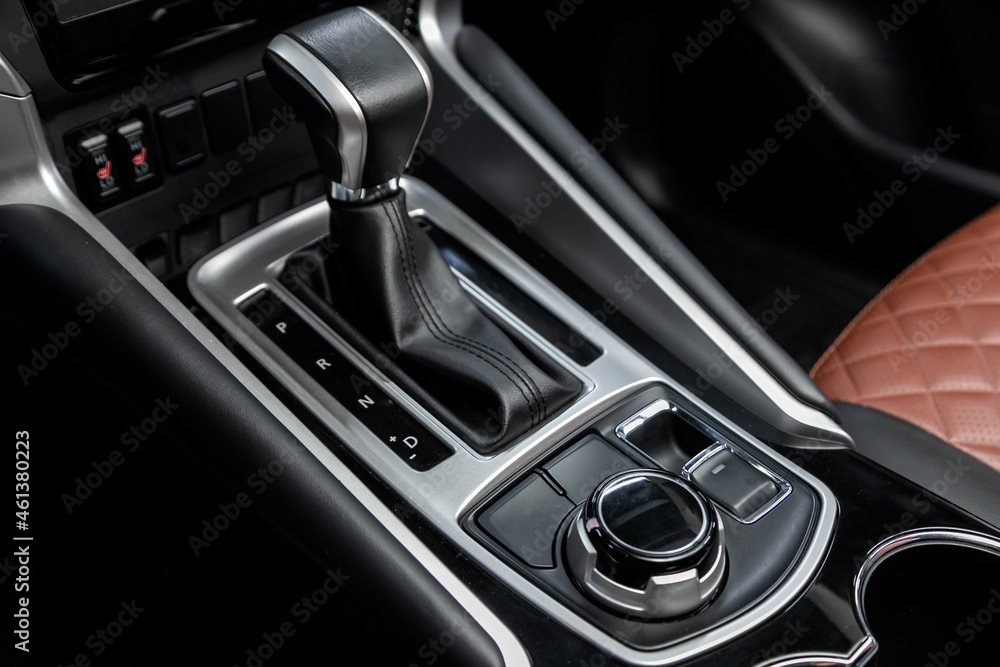 Close-up view of the automatic gearbox lever. Interior car, automatic transmission gearshift stick Close-up view of the automatic gearbox lever. Interior car, automatic transmission gearshift stick