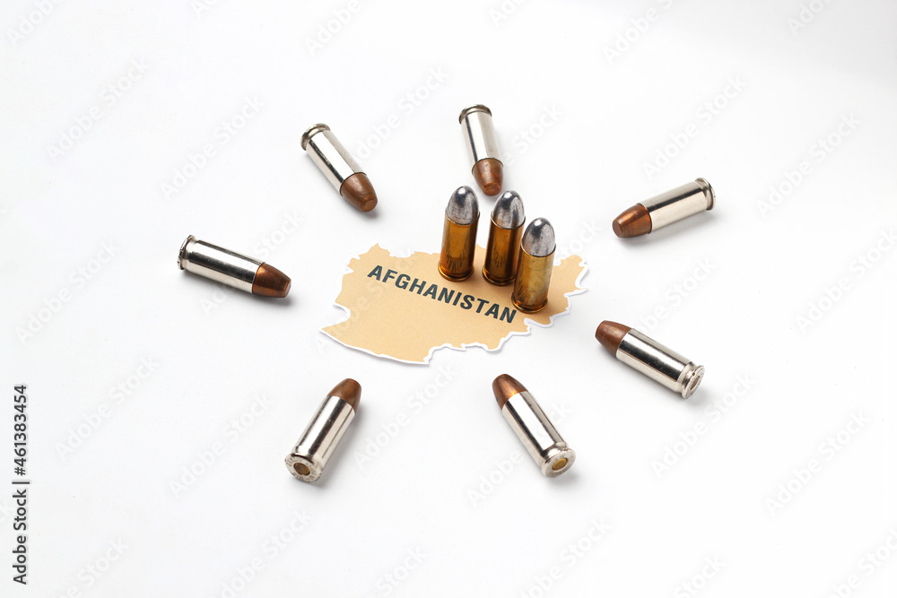 Afghanistan map logo icon with real gun bullet ammo around country on white background in concept of middle east war and conflict Afghanistan map logo icon with real gun bullet ammo around country on white background in concept of middle east war and conflict