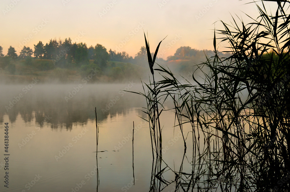 Fototapeta premium Misty haze on the river in the morning