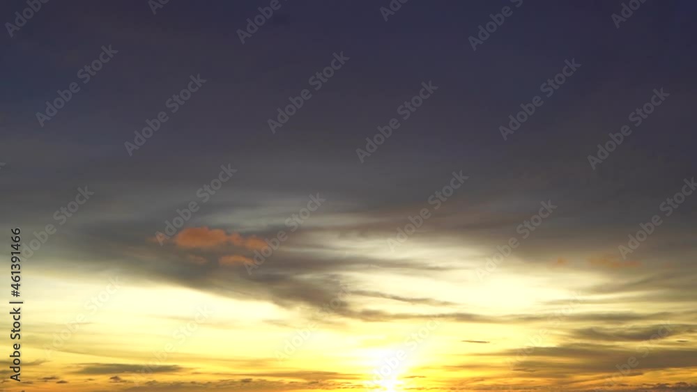 the sun is setting On the golden sky, there are yellow, orange light, very beautiful. the sun is setting On the golden sky, there are yellow, orange light, very beautiful.