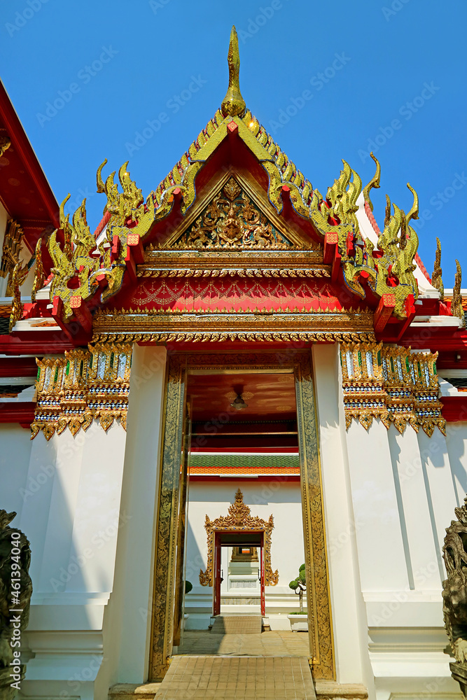 Fototapeta premium Gorgeous Inner Gate of the Temple of the Reclining Buddha or Wat Pho, One of the Oldest Buddhist Temples in Bangkok, Thailand