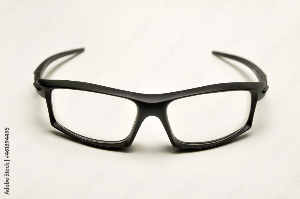 Reading glasses with black frames on a white background Reading glasses with black frames on a white background
