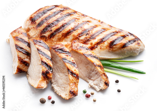 Tablou Canvas Grilled chicken fillet with herbs isolated on white background.