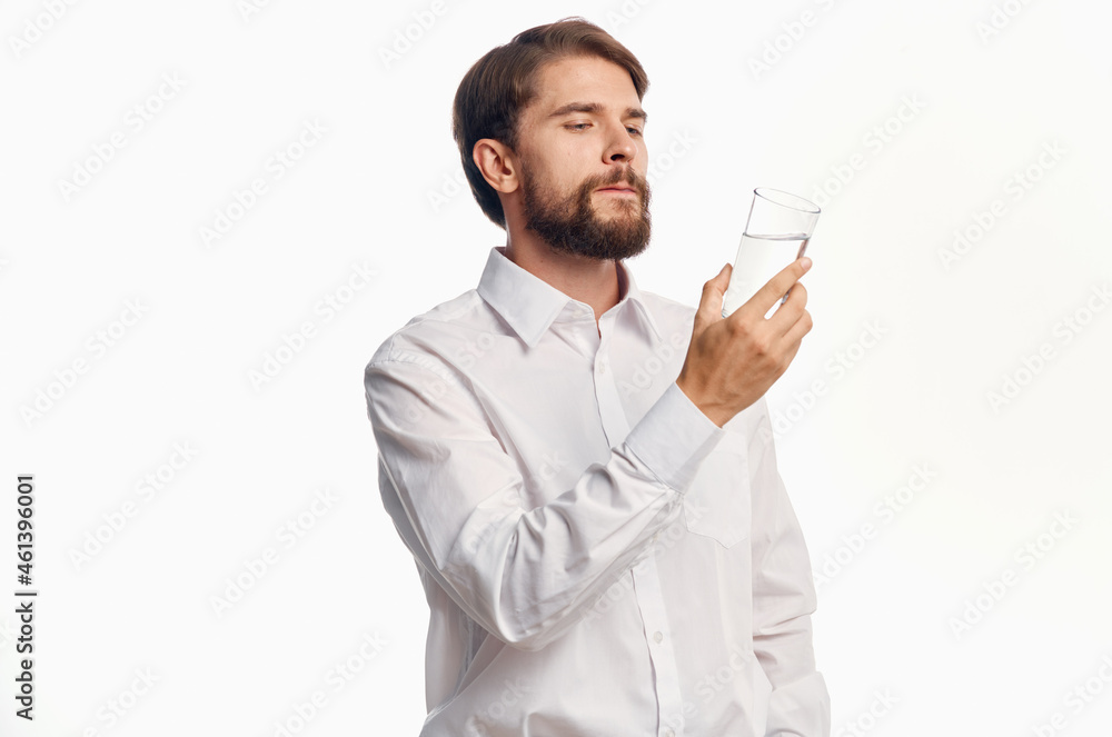handsome man glass of water light background handsome man glass of water light background
