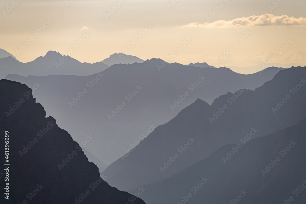 Abstract silhouette view of the alps allgäu between austria and germany at sunrise