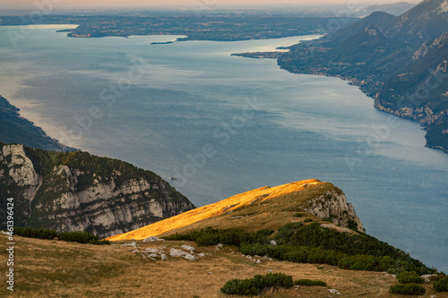 sunrise at lake garda from monte altissimo with view of south side of the lake in the morning, italy photo
