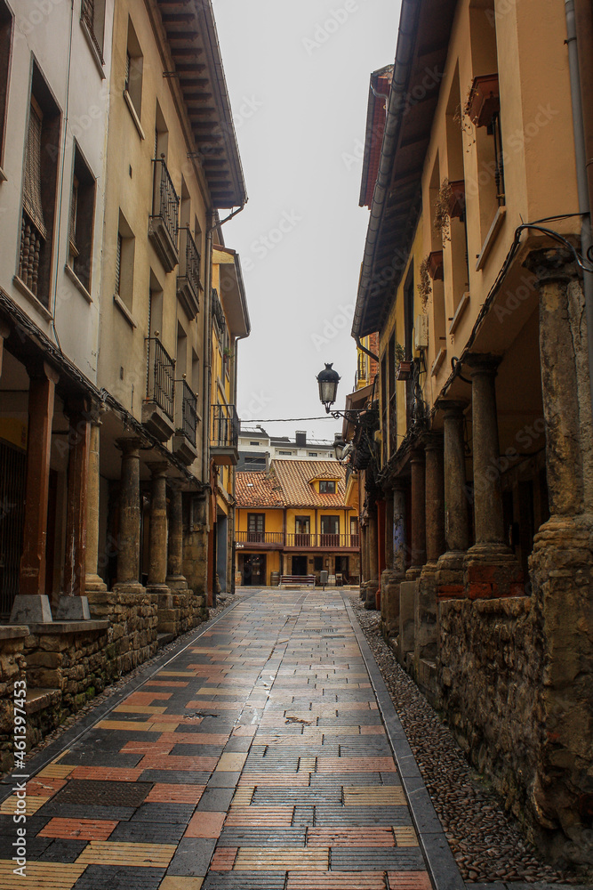 Narrow street at medieval downtown in Aviles in the north of Spain