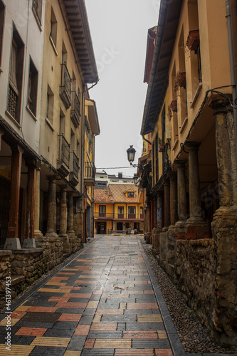 Fototapeta Naklejka Na Ścianę i Meble -  Narrow street at medieval downtown in Aviles in the north of Spain