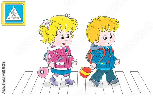 Cheerful little schoolboy and schoolgirl with backpacks going to their school and crossing a road on a zebra crossing, vector cartoon illustration isolated on a white background