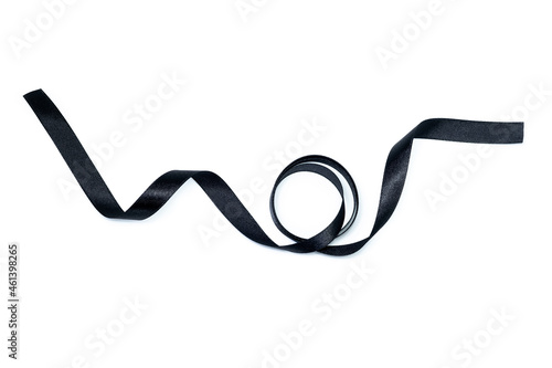 Beautiful black ribbon twist spiral isolated on white background.
