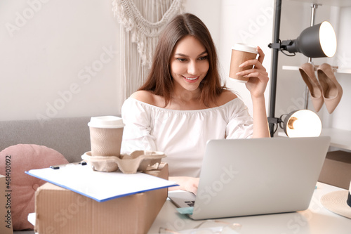 Female business owner worki...