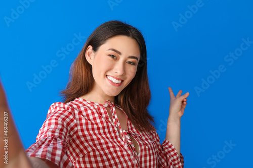 Stylish young Asian woman t...