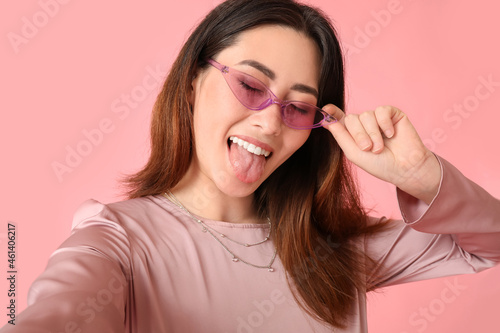Stylish young Asian woman t...