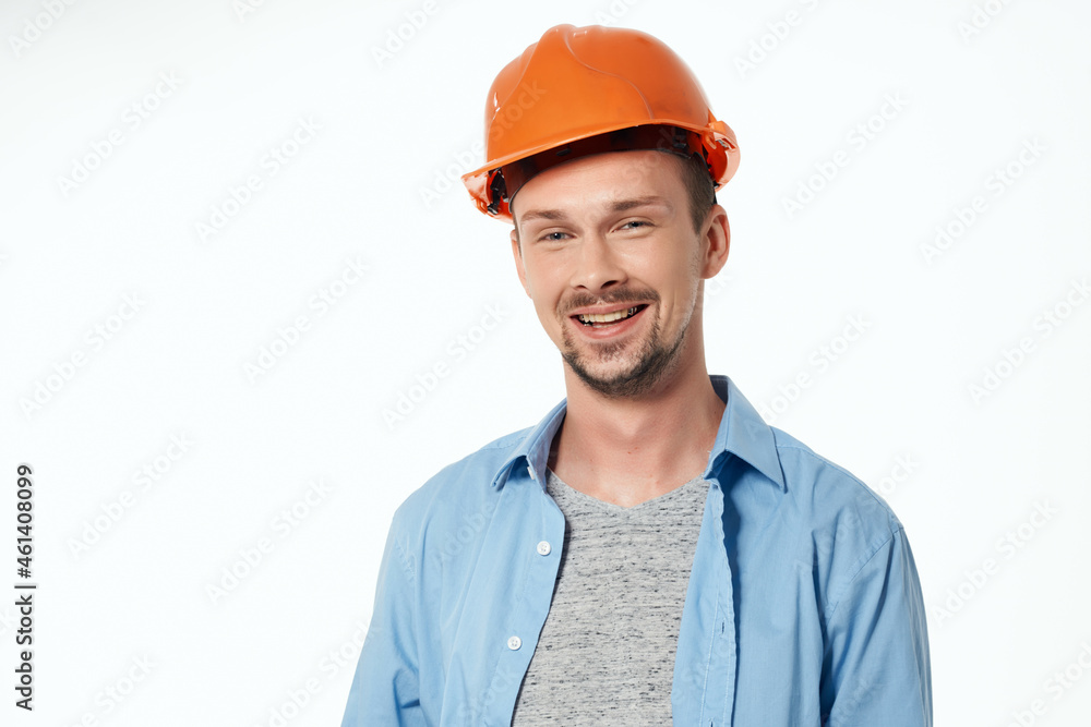 man in orange helmet Professional Job isolated background man in orange helmet Professional Job isolated background