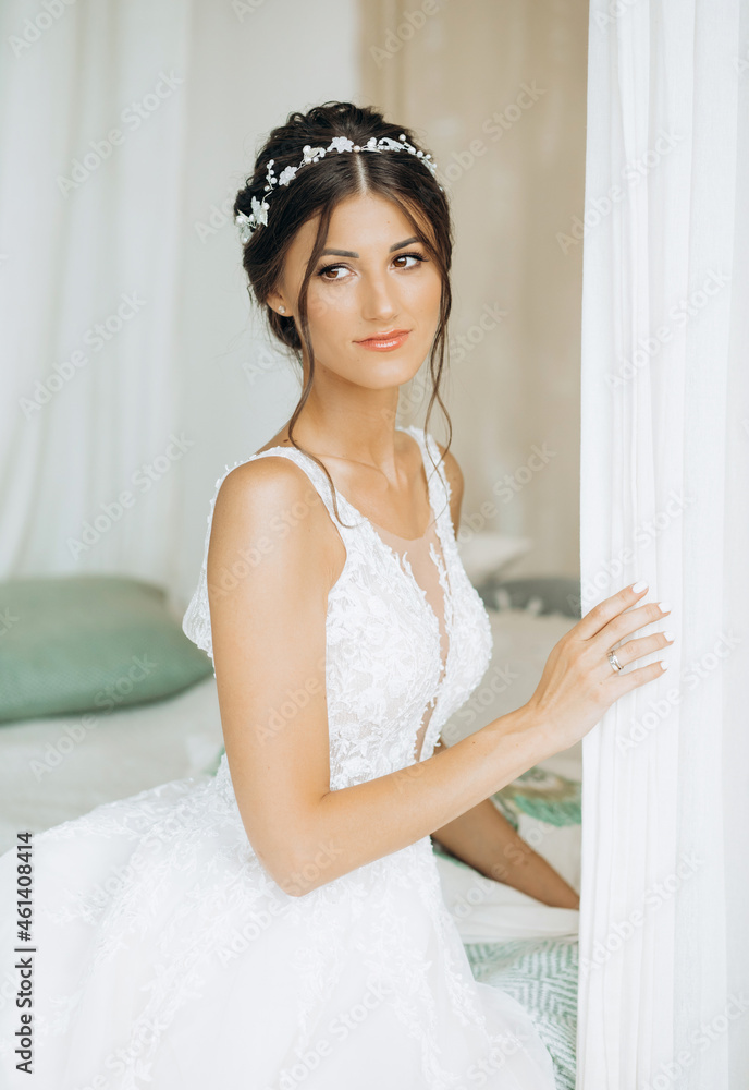 Morning of the bride. Beautiful brunette in an amazing dress Morning of the bride. Beautiful brunette in an amazing dress