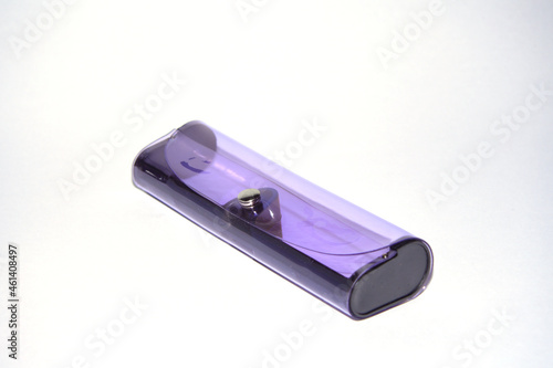 The new eyeglass case is made of transparent blue silicone. on an isolated white background. 