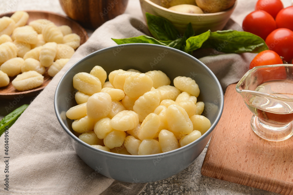 Bowl with tasty gnocchi on table Bowl with tasty gnocchi on table