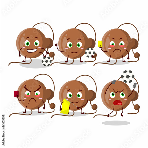 Firecracker ball cartoon character working as a Football referee