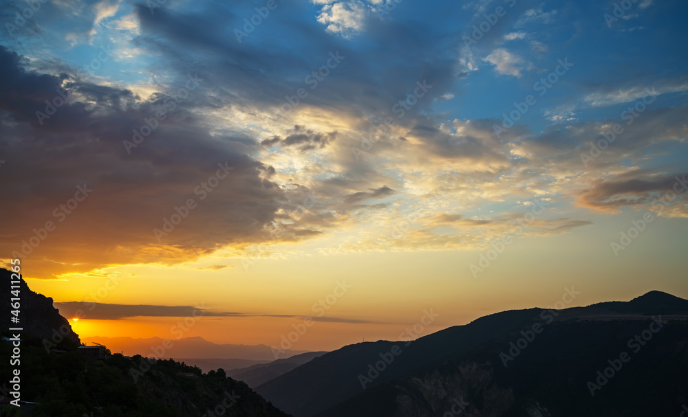 Fototapeta premium A beautiful dawn over the mountains in Tatev