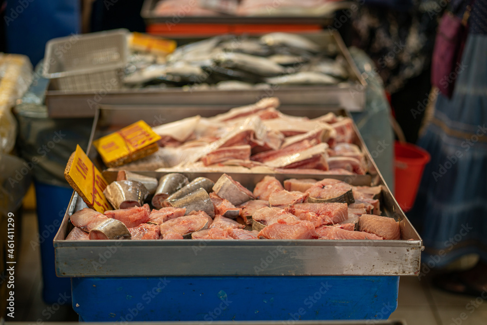 Different kinds of fish cut into pieces at wet market in Singapore ...