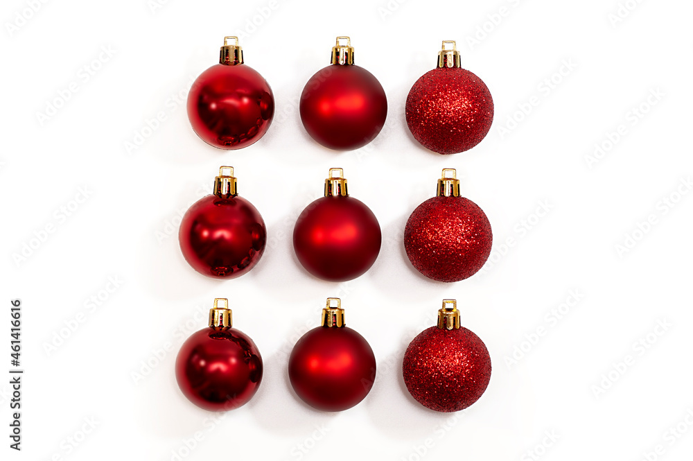 Red Christmas decorations on a white background. flat lay. Holiday concept Red Christmas decorations on a white background. flat lay. Holiday concept