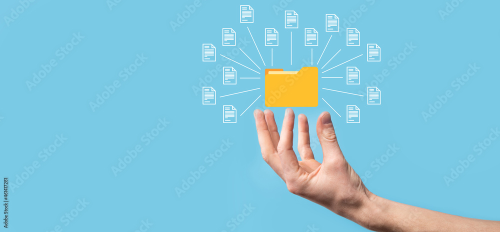 Document Management System DMS .Businessman hold folder and document icon.Software for archiving, searching and managing corporate files and information.Internet Technology Concept.Digital security. Document Management System DMS .Businessman hold folder and document icon.Software for archiving, searching and managing corporate files and information.Internet Technology Concept.Digital security.