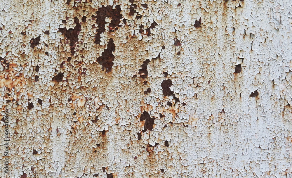Fototapeta premium Close-up of rust on white metal sheet, Ruins of metal and the rust on the surface, Brown rustic peel off from the surface of iron plate, Damaged iron from oxidation of air and water