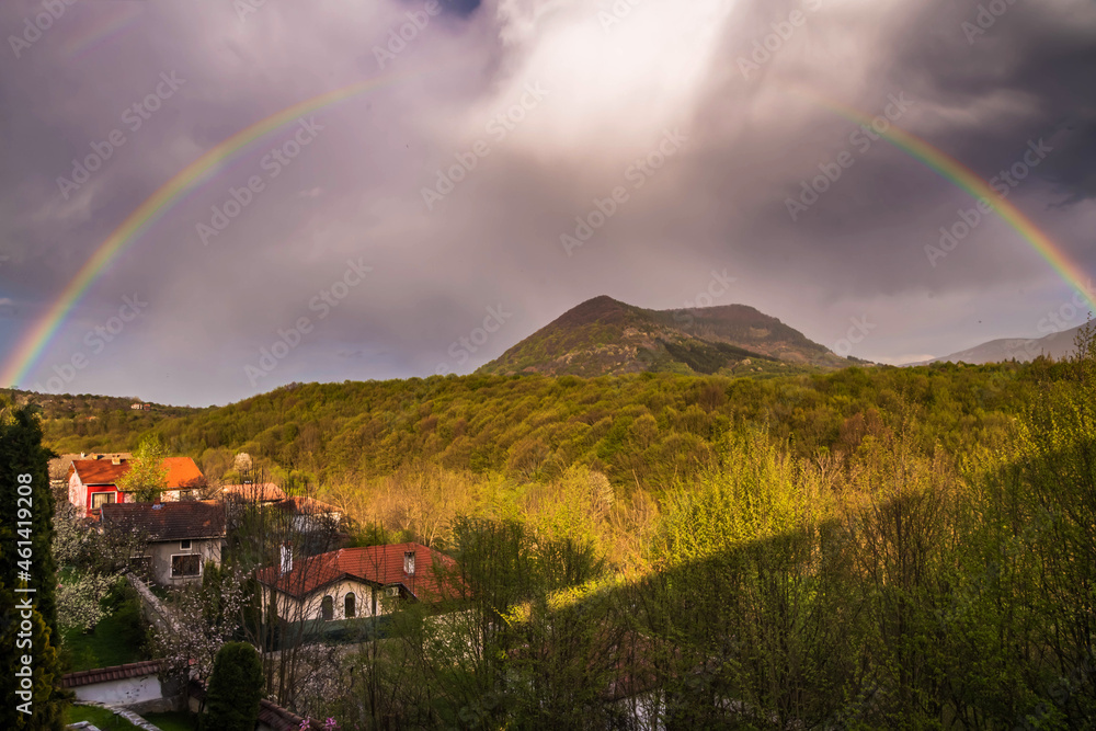 Beautiful rainbow over Ostrets peak